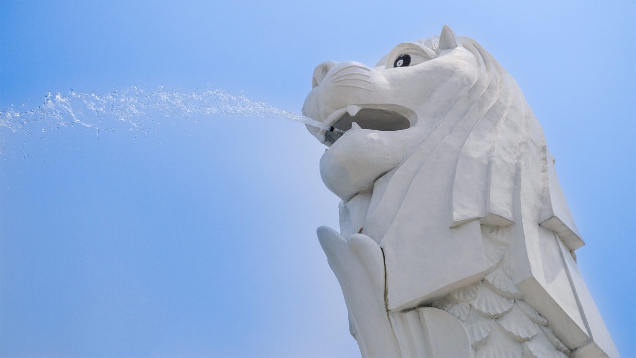 Close up of the iconic Merlion statue in Singapore, spouting water