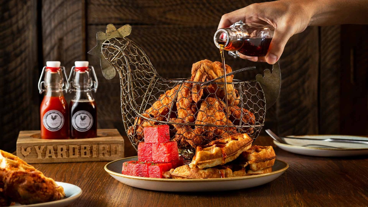 Family of three celebrating Father's Day 2024 with a dinner at Yardbird
